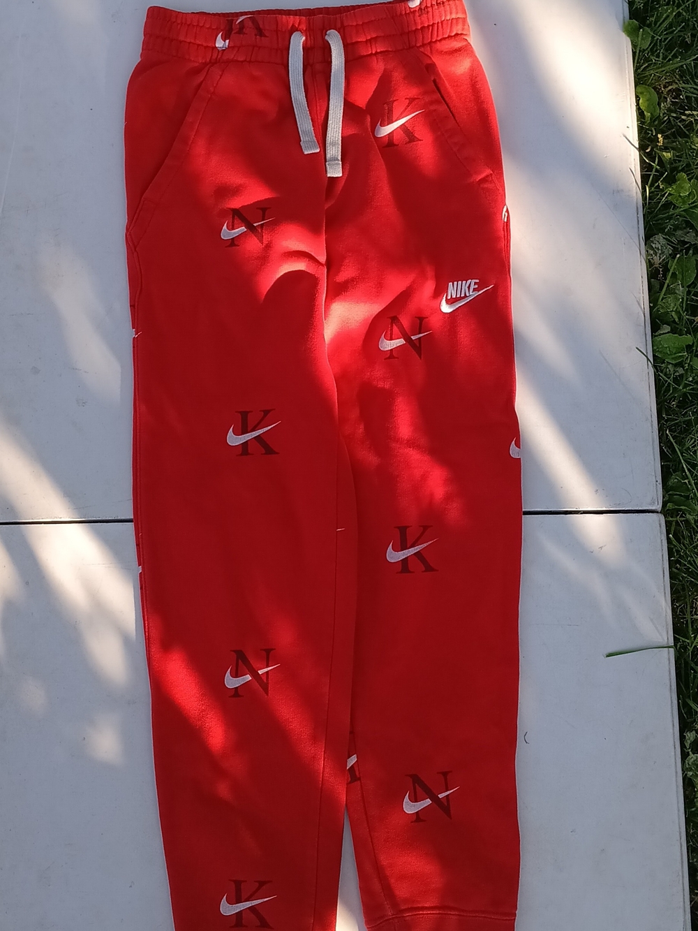 Nike Red Logo-Scatter Joggers for Kids